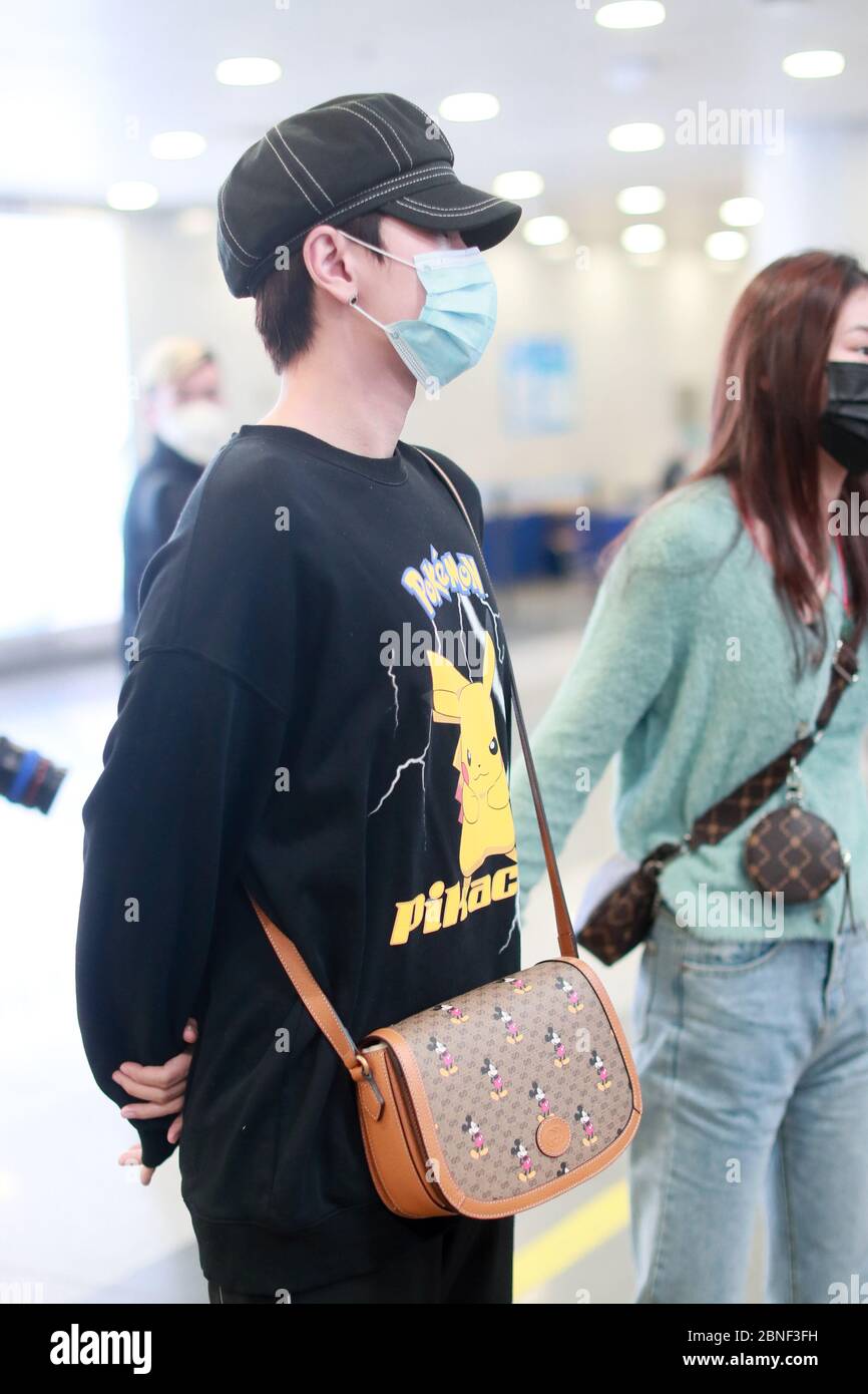 Chinese pop singer and songwriter Wang Sulong or Silence Wang arrives at a  Beijing airport before departure in Beijing, China, 14 April 2020. Bag: Gu  Stock Photo - Alamy