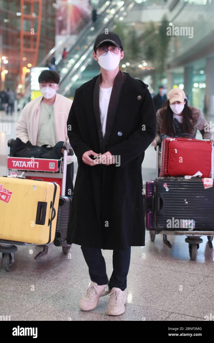 Chinese actor Zhang Yujian arrives in an airport in Beijing, China ...