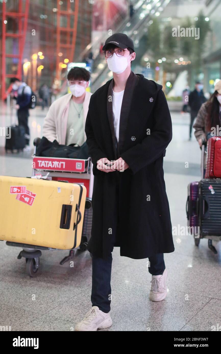 Chinese actor Zhang Yujian arrives in an airport in Beijing, China ...