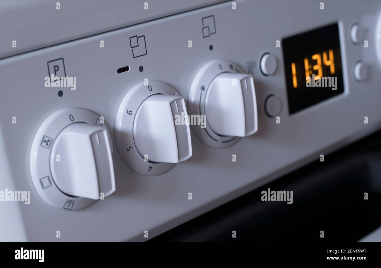 Handles of adjustment of power of heating of the electric stove Stock Photo Alamy