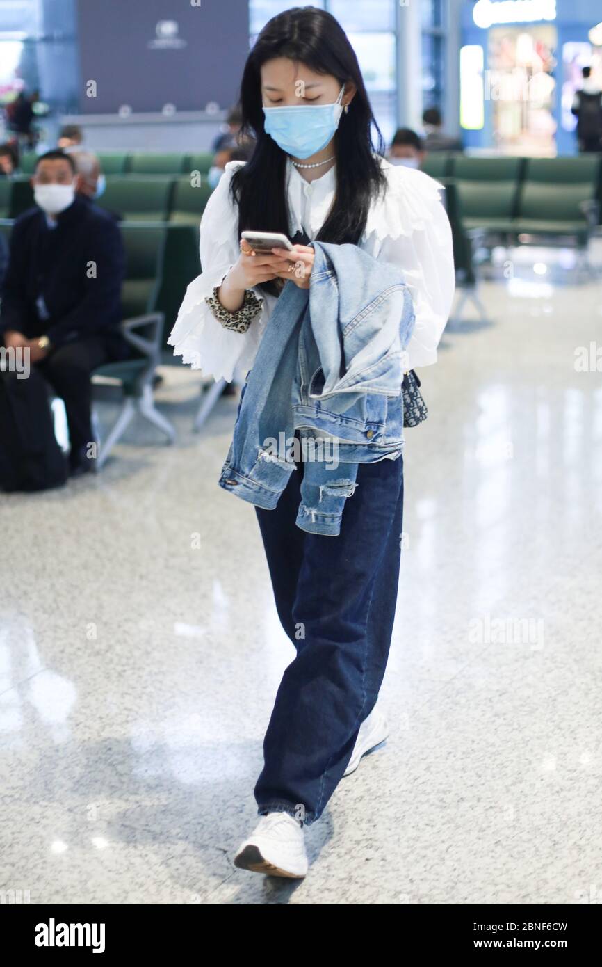 Chinese actress Zhang Ruonan arrives at a Beijing airport before ...