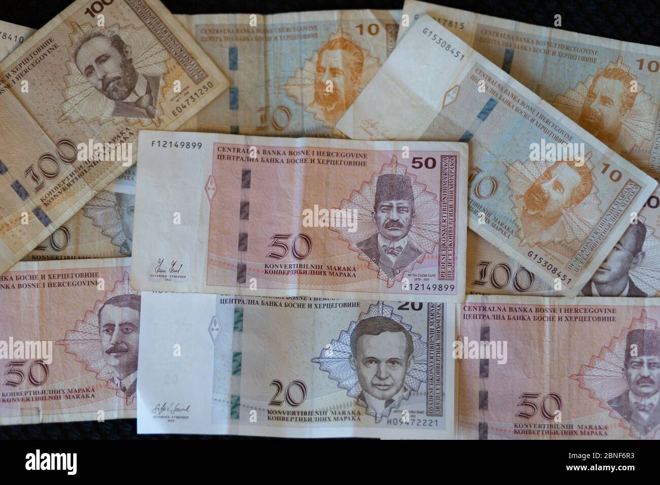 Closeup shot of the banknotes of Bosnia and Herzegovina currency spread on the surface Stock Photo