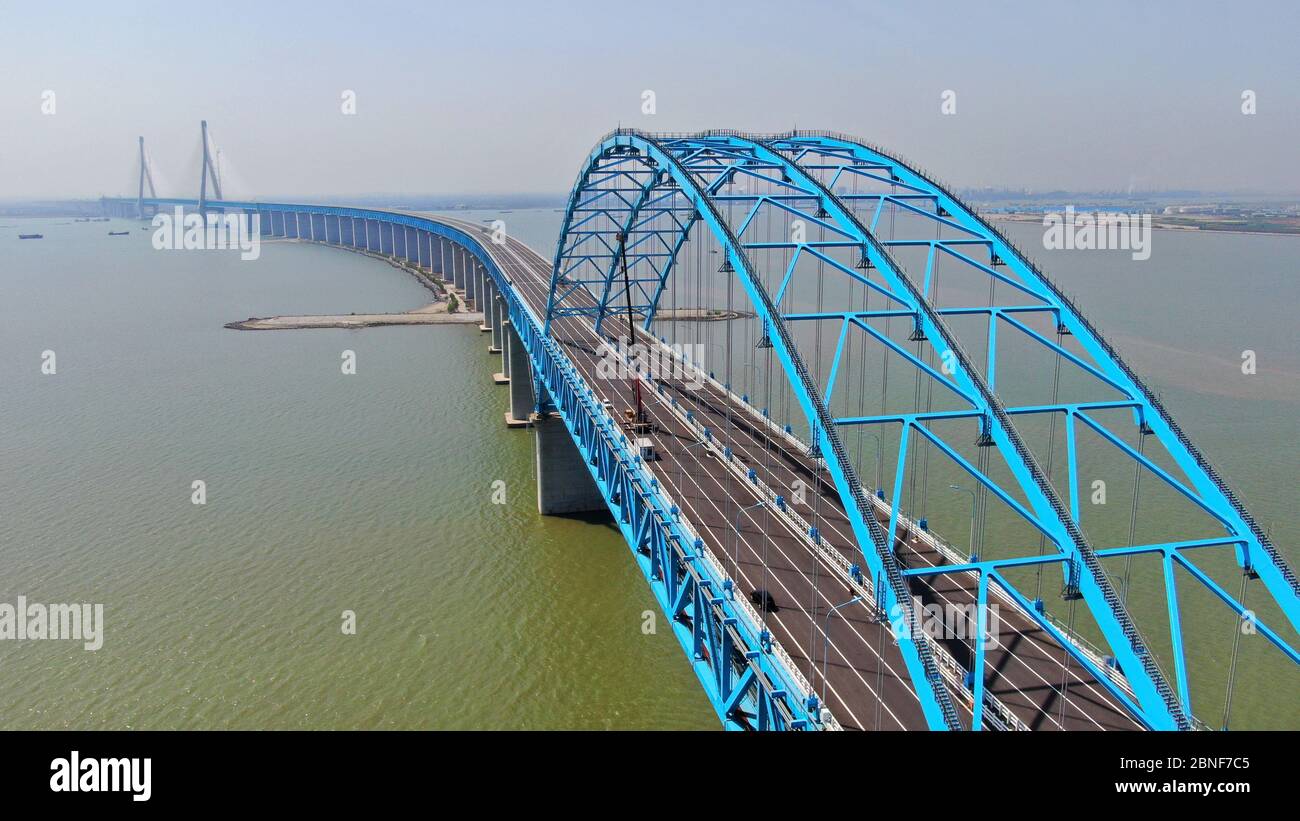 The largest cable-stayed road-rail bridge, Tiansheng Harbor Bridge, a part of Shanghai-Nantong Yangtze River Bridge, which connects Shanghai and Nanto Stock Photo