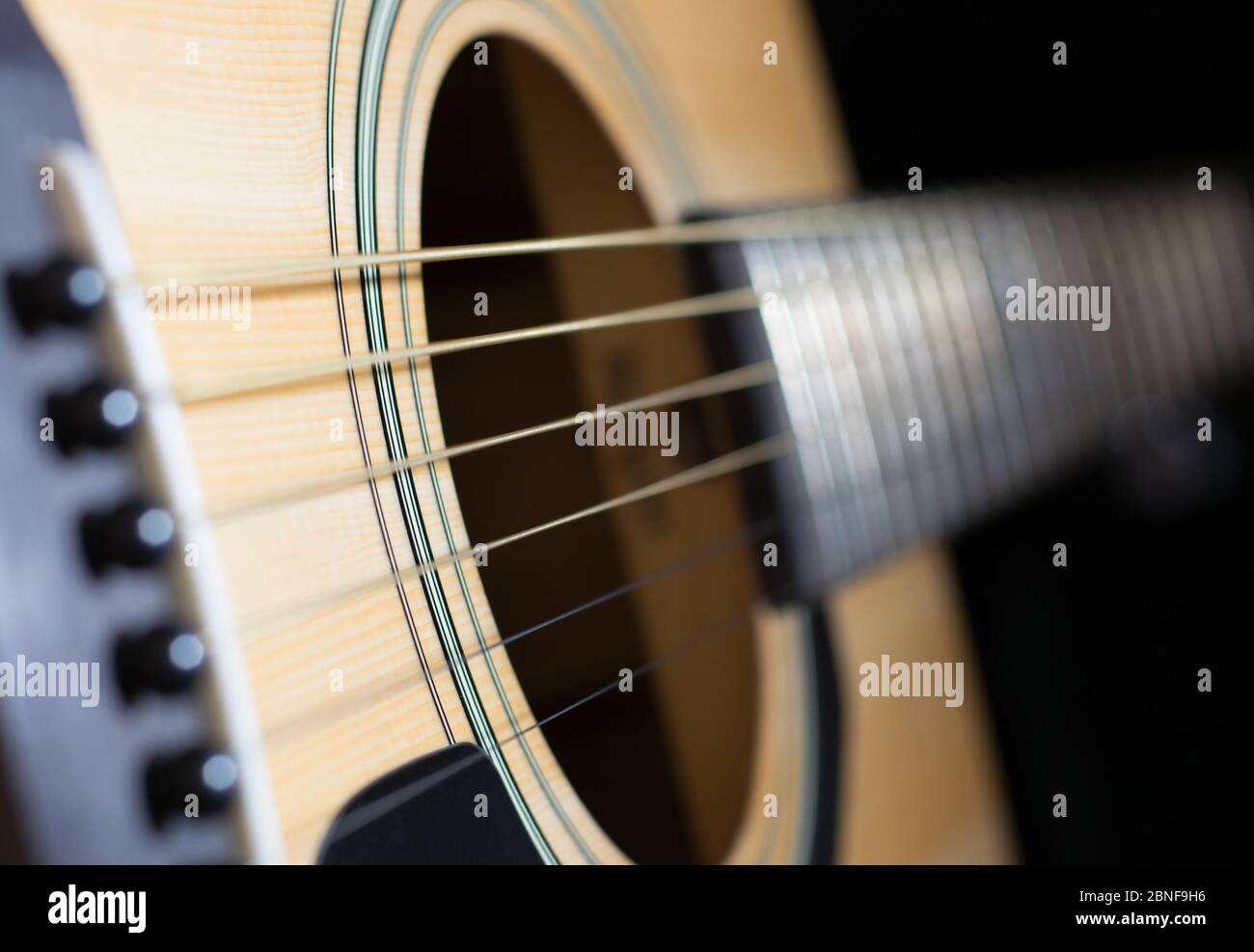 Parts of acoustic guitar close-up Stock Photo