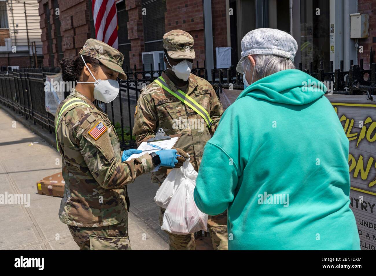 NEW YORK, NY MAY 14, 2020 US Army National Guard hand out food and other essentials for