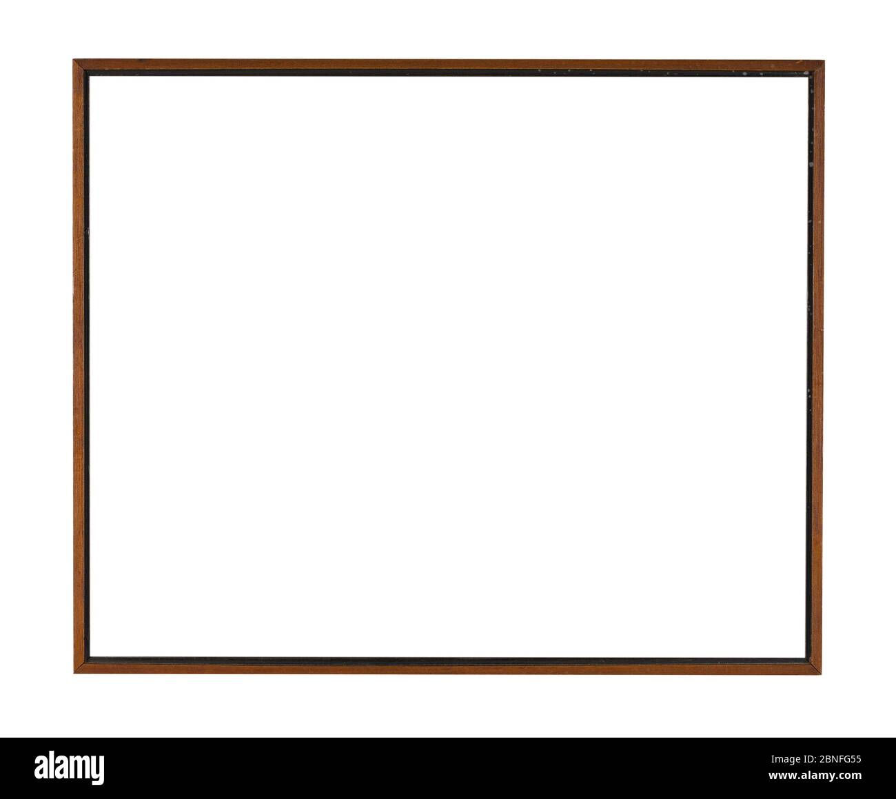 Thin wooden vintage frame for a photo on white background Stock Photo