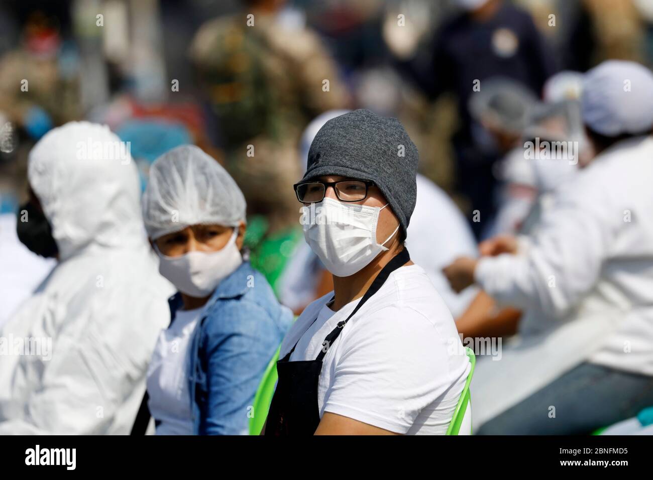 Lima, Peru. 14th May, 2020. A group of market vendors wait for blood rapid diagnostic tests for the new coronavirus disease, COVID-19 at a market in Villa El Salvador Credit: Mariana Bazo/ZUMA Wire/Alamy Live News Stock Photo