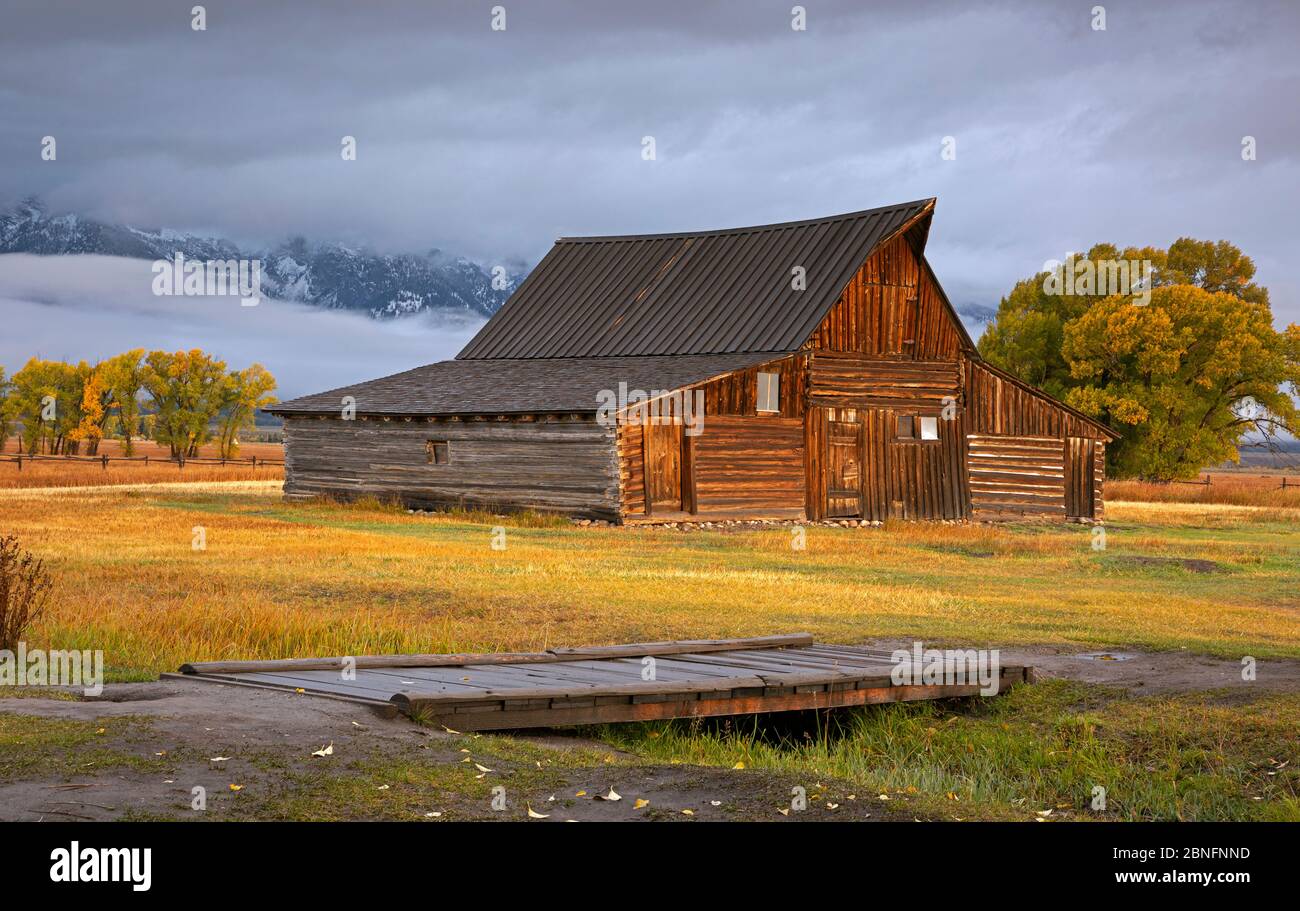 WY04307-00....WYOMING - Old barn on a cloudy mornng, located on historic Morman Row in Grand Teton National Park. Stock Photo