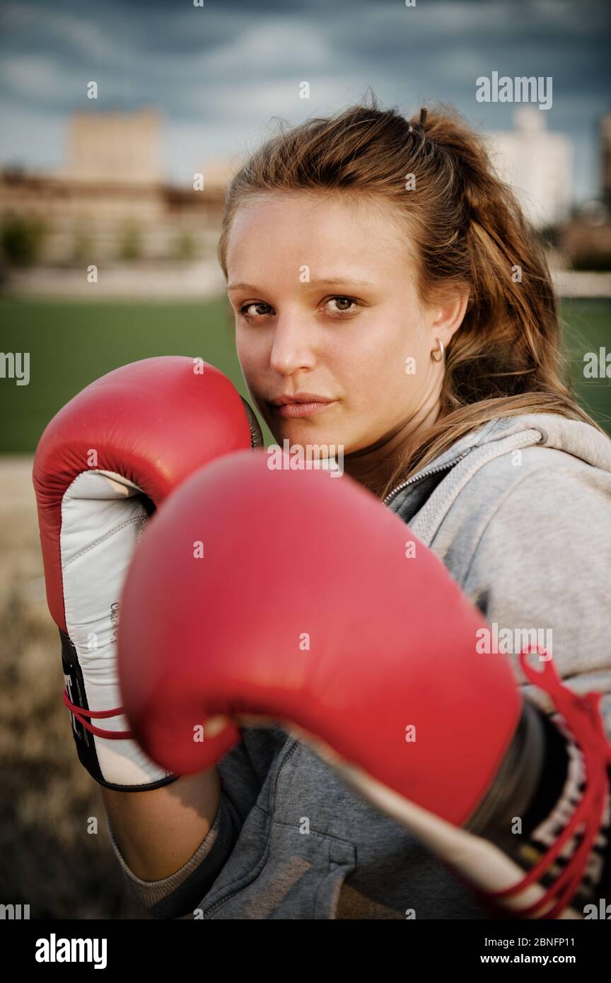 Beautiful woman boxing gloves smiling hires stock photography and