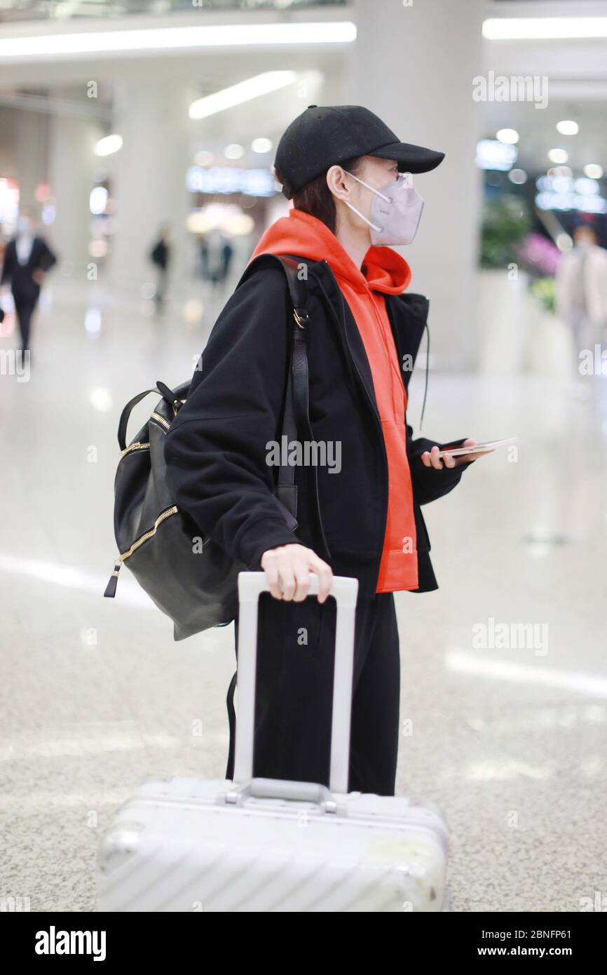 Chinese actress Liu Mintao shows up at a Shanghai airport after landing ...