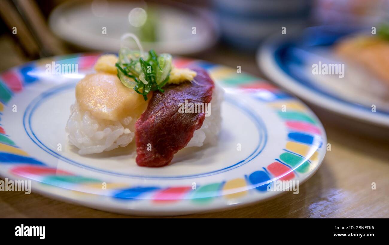 Sushi in a Japan restaurant. Traditional Kaitenzushi Japanese food