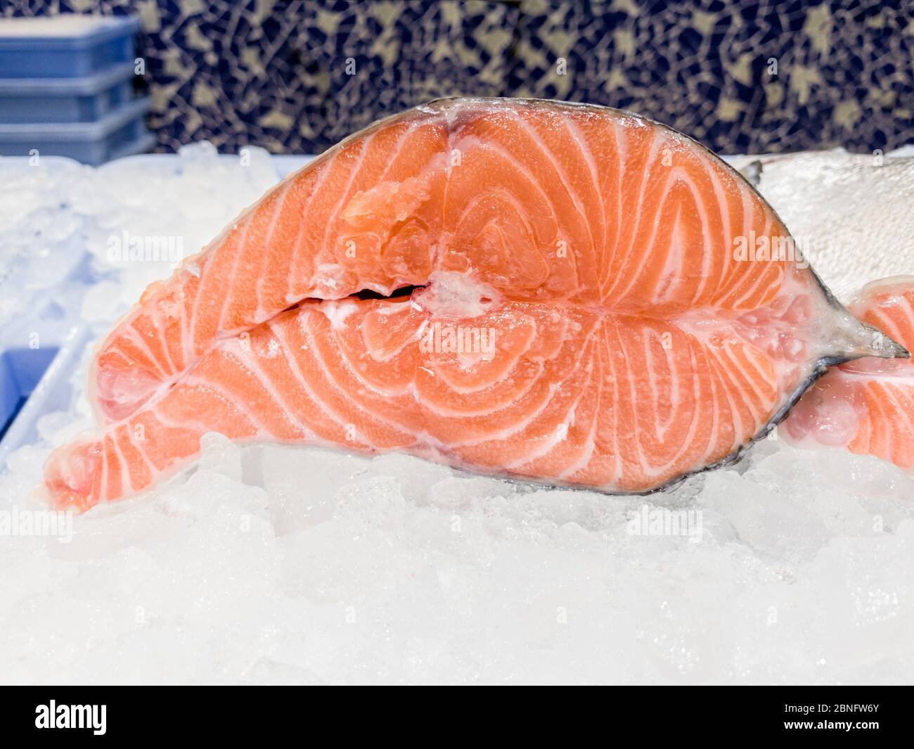 Close Up of fresh fillets salmon in a supermarket refrigerated display
