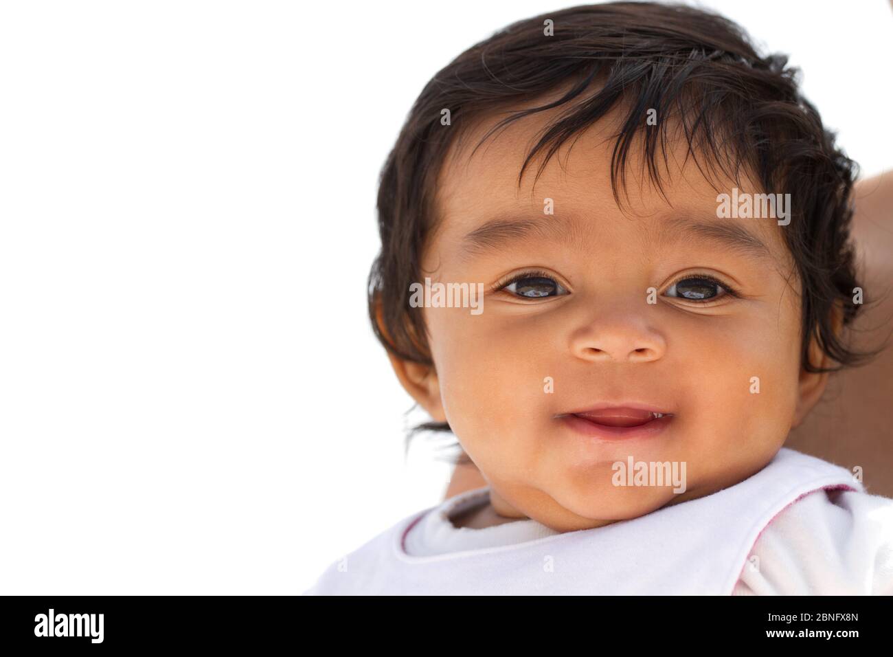 Portrait of a cute little Hispanic baby smiling Stock Photo - Alamy