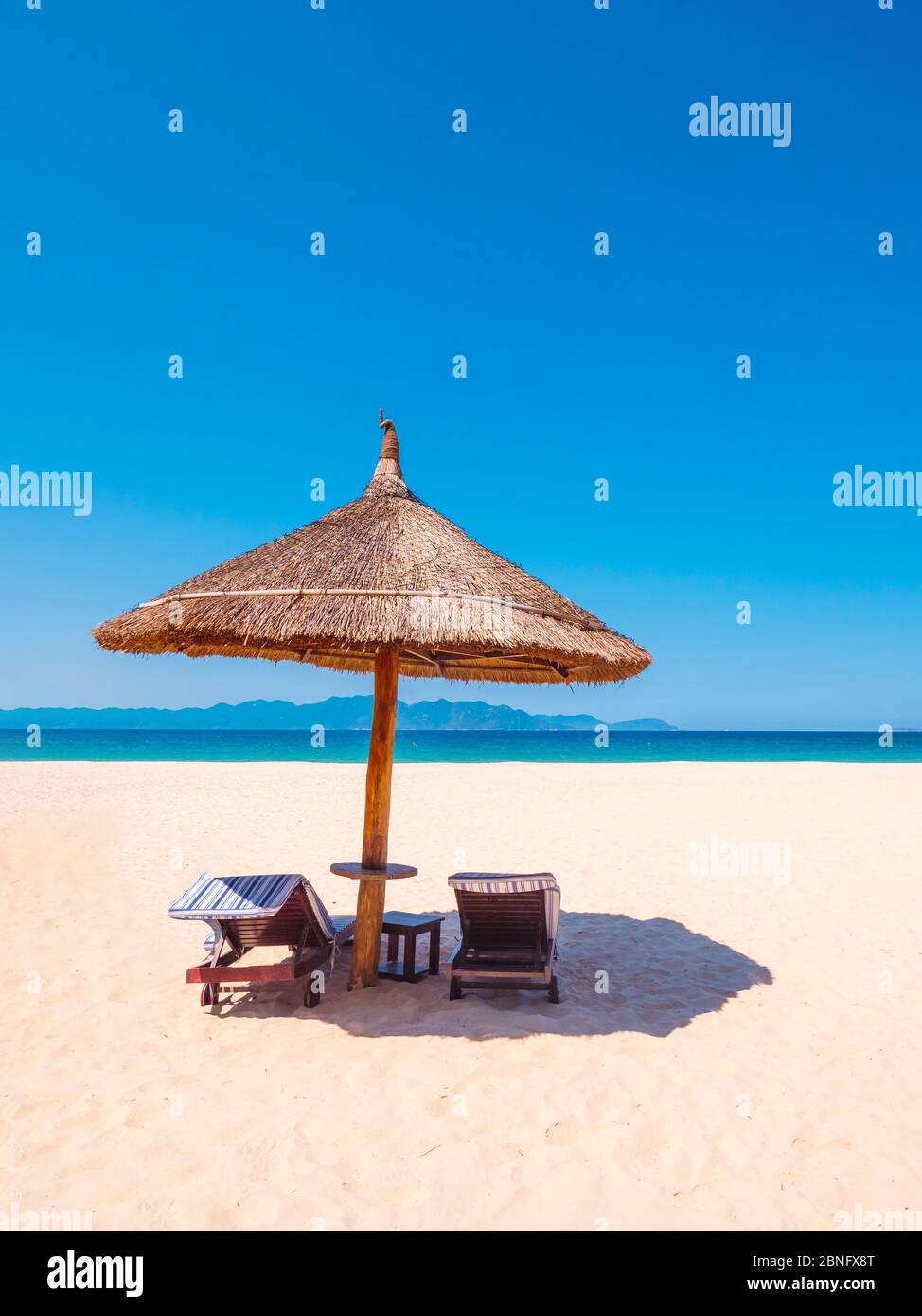 Luxury Beach With Umbrella And Chairs Near Ocean Stock Photo Alamy