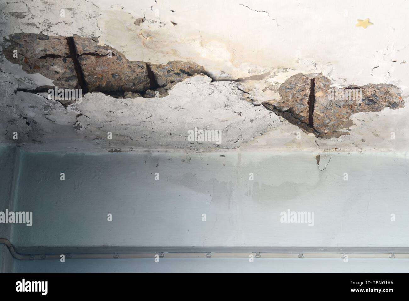 Cracks in Ceiling texture are the danger, close up view Stock Photo