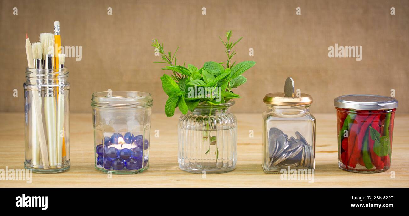 Recycle jars reuse for different contents, recycling at home for sustainable living, save money and zero waste Stock Photo