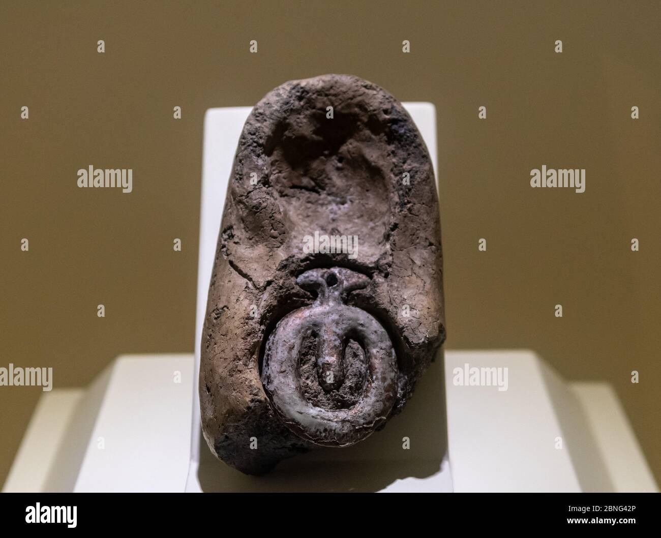 Closeup shot of Hittite artefact on stem Stock Photo