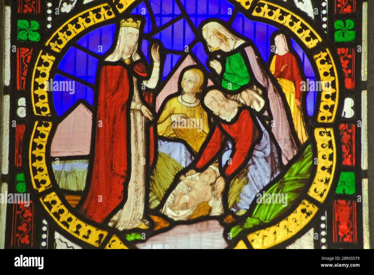 A Victorian stained glass window depicting the baby Moses being discovered in his basket amid bullrushes on the River Nile by the Princess daughter of Stock Photo
