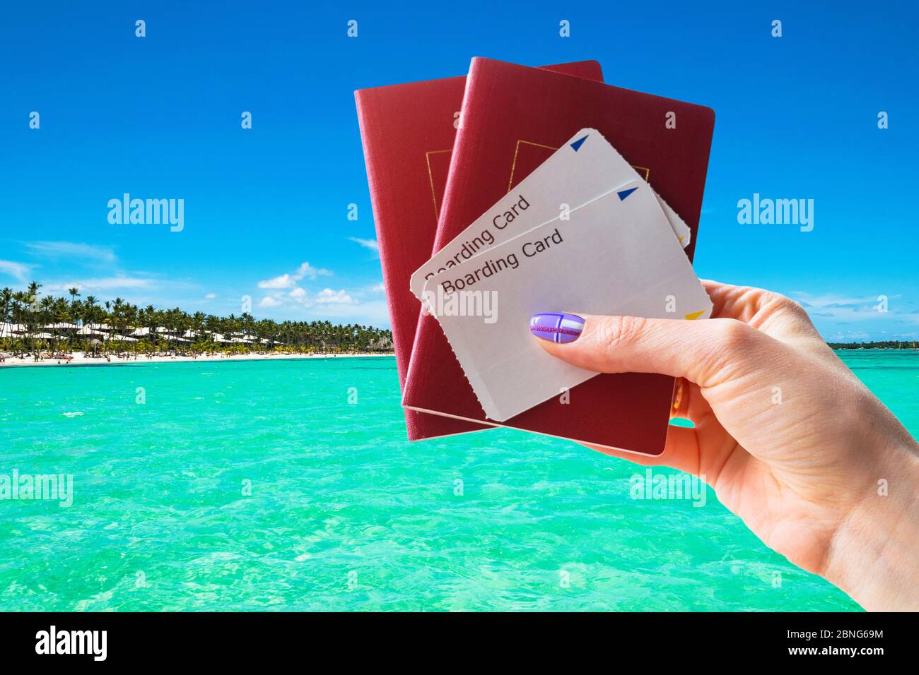 Closeup of beautiful woman hand holding passports and boarding pass ...