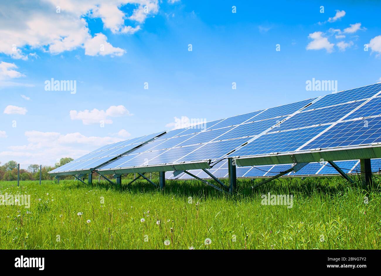 Solar panels and blue sky. Solar panels system power generators from sun. Clean technology for better future Stock Photo
