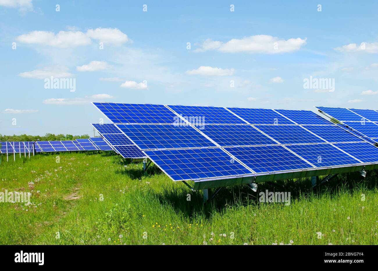 Solar panels and blue sky. Solar panels system power generators from sun. Clean technology for better future Stock Photo