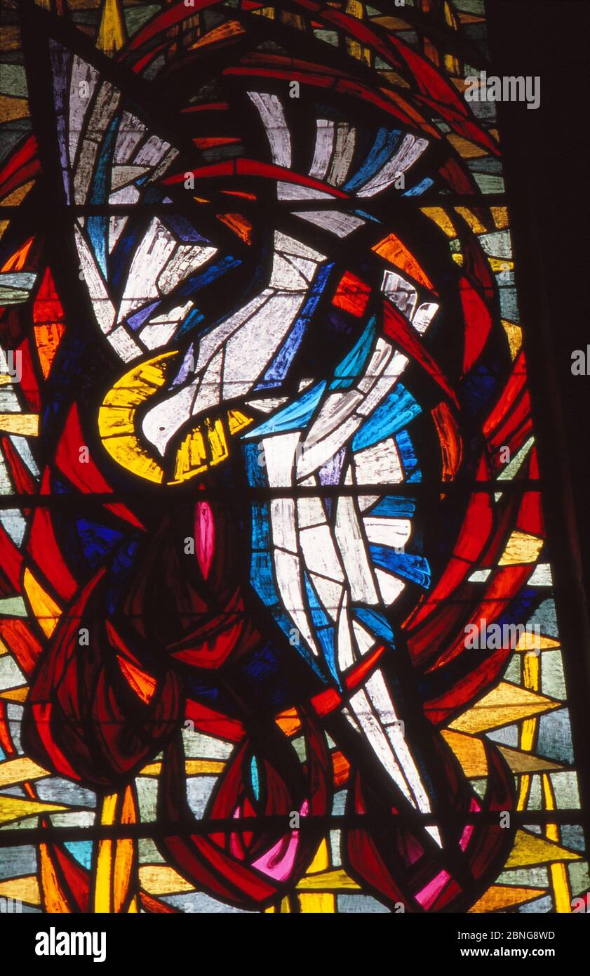 LOS ANGELES, UNITED STATES - May 20, 1988: Stained Glass depiction of Holy Spirit as Dove at Pentecost. Stock Photo