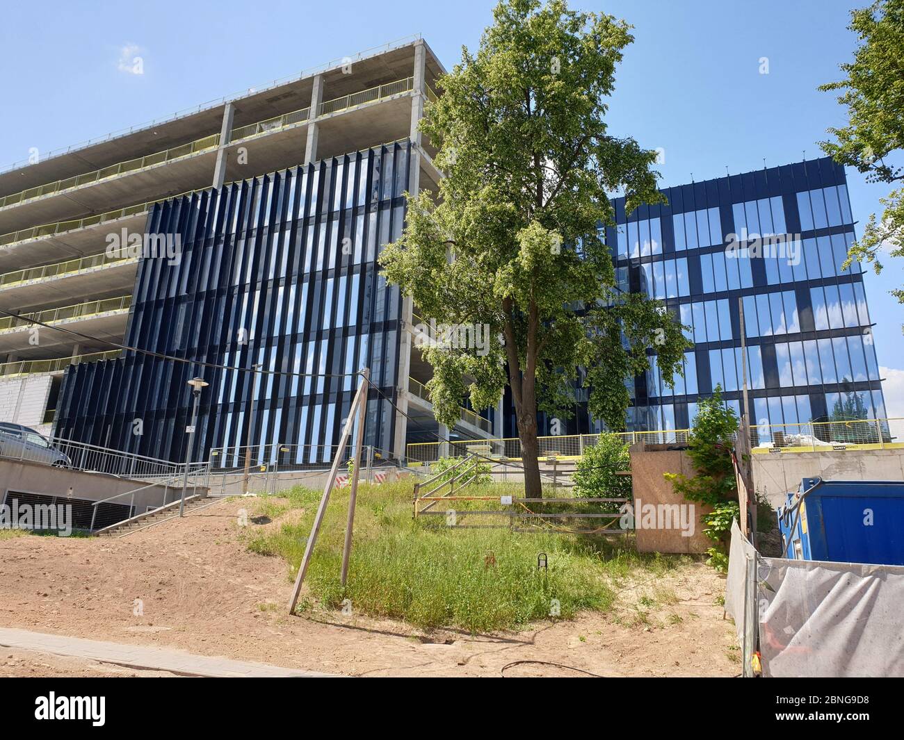 Construction of new office building with not all windows Stock Photo ...