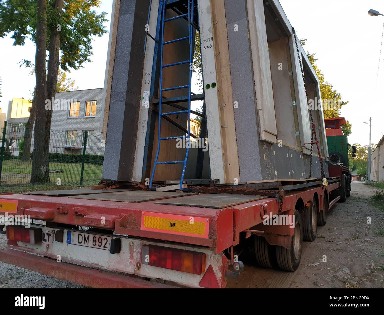 Truck with prepared building wall parts Stock Photo