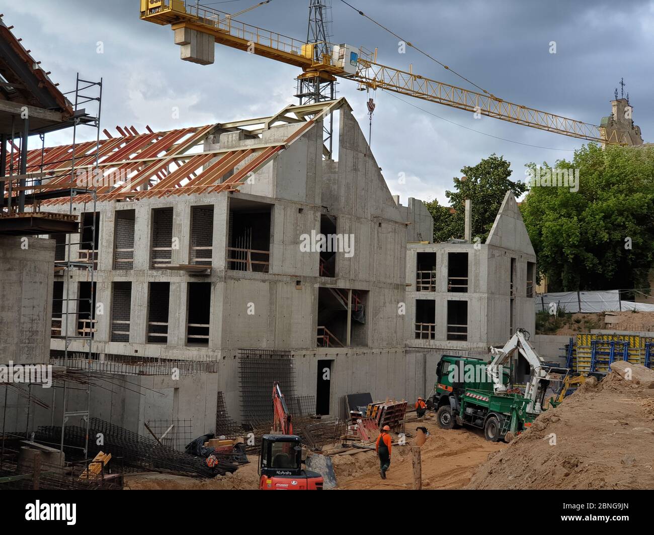 Concrete buildings construction site with crane Stock Photo