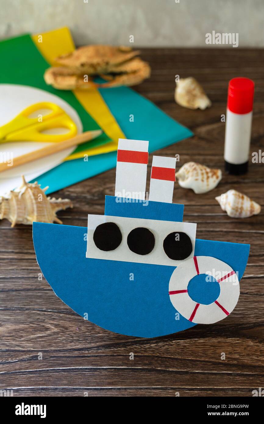 Gift Paper Boat For Father'S Day On A Wooden Table. Children'S Art Project,  Craft For Children. Craft For Kids Stock Photo - Alamy