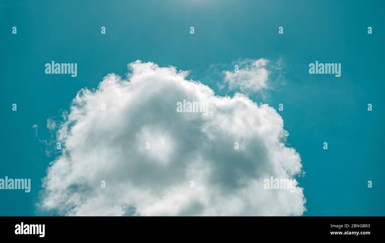 Low angle shot of a cloud in the blue clear sky - perfect for ...