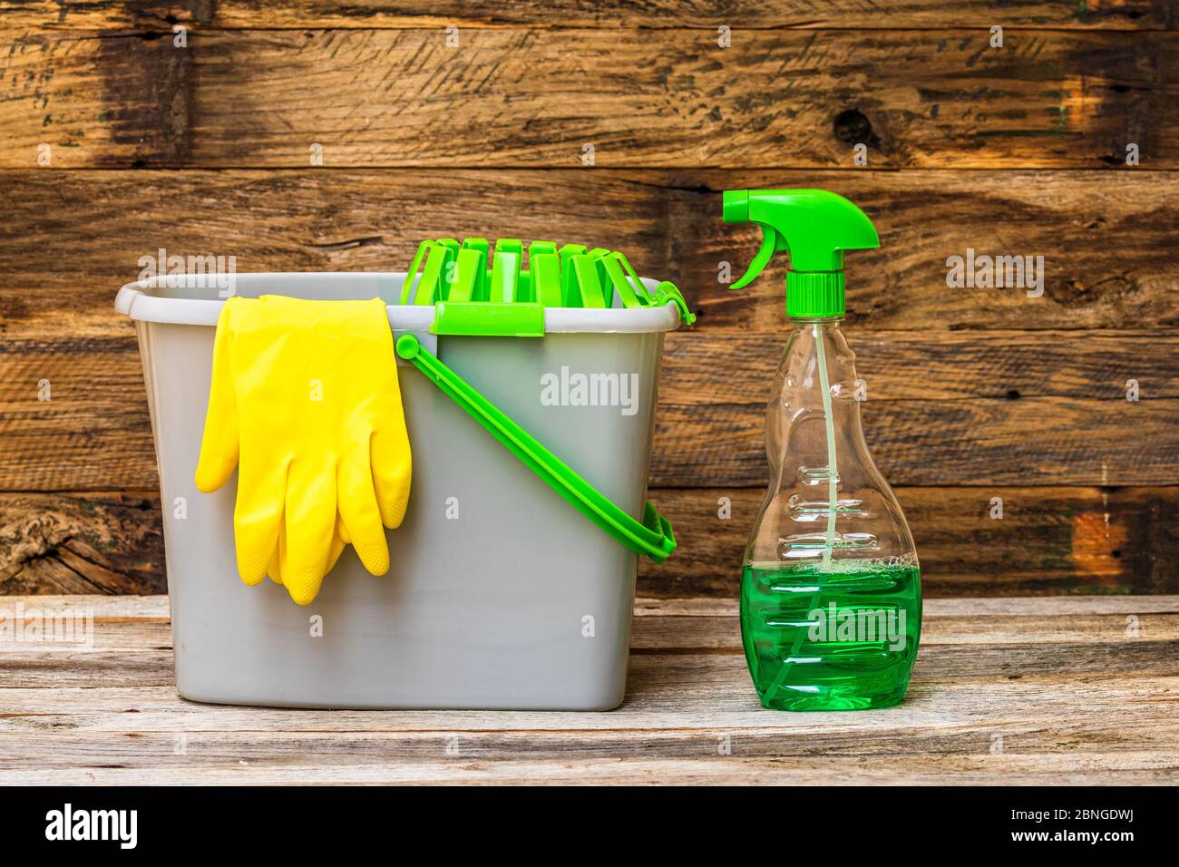 Cleaning sprayer anti bacterial sanitizer spray isolated with mop