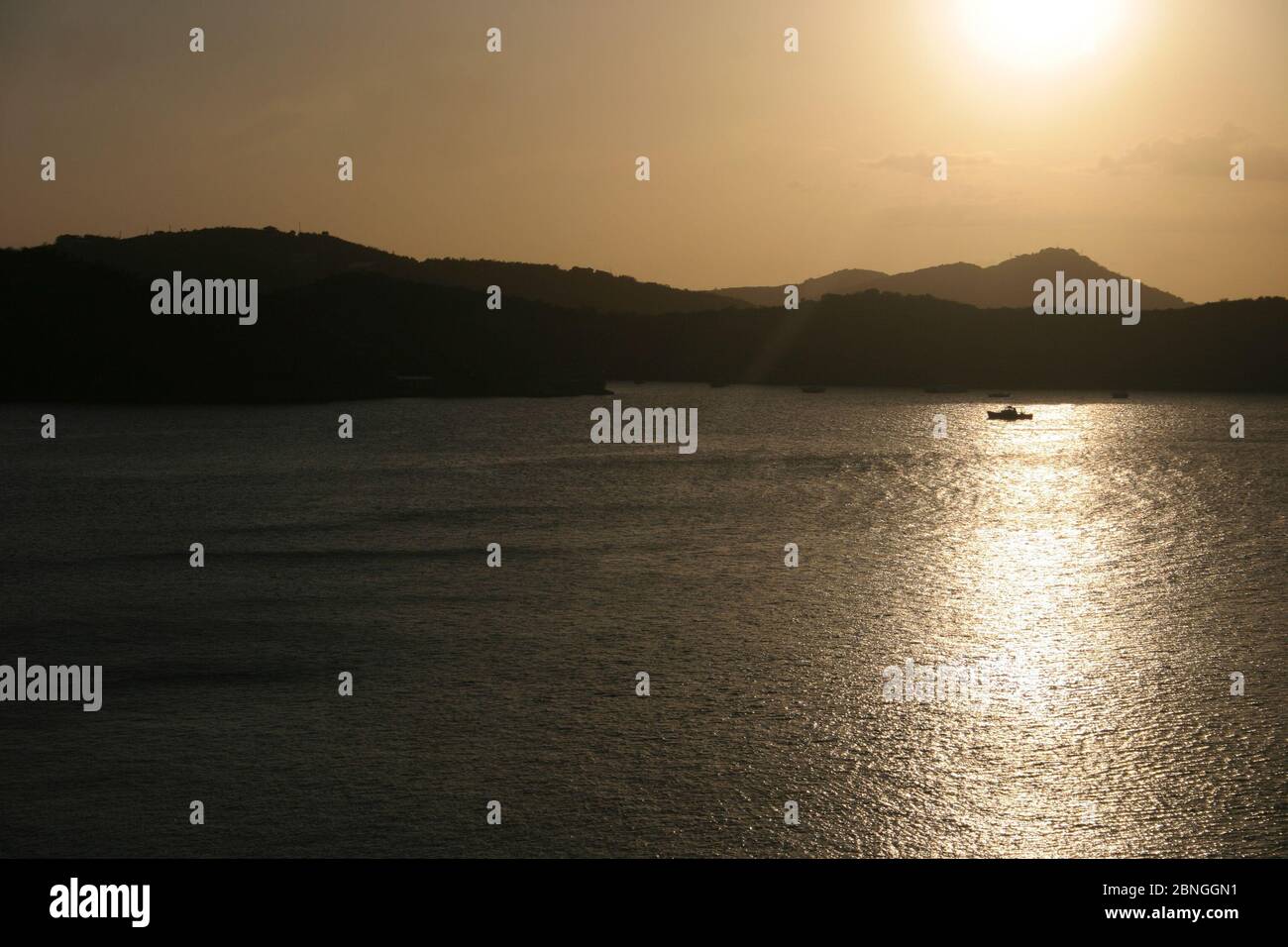 Beautiful sunset over the mountain and the lake Stock Photo - Alamy