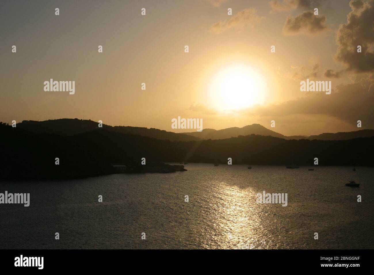 Beautiful sunset over the mountain and the lake Stock Photo - Alamy