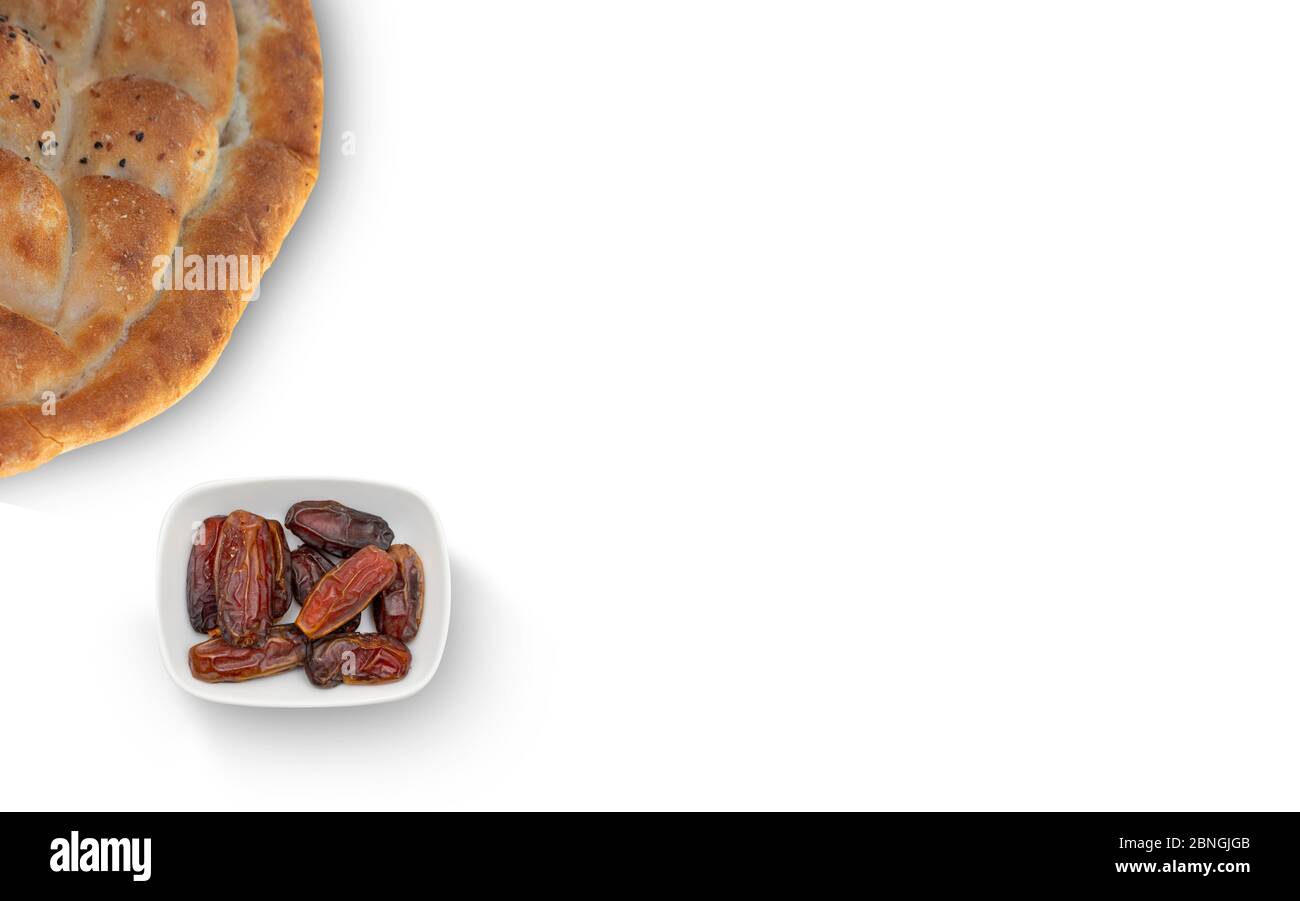 Ramadan Pita ( Ramazan Pidesi ) pitted dates isolated on white background Stock Photo