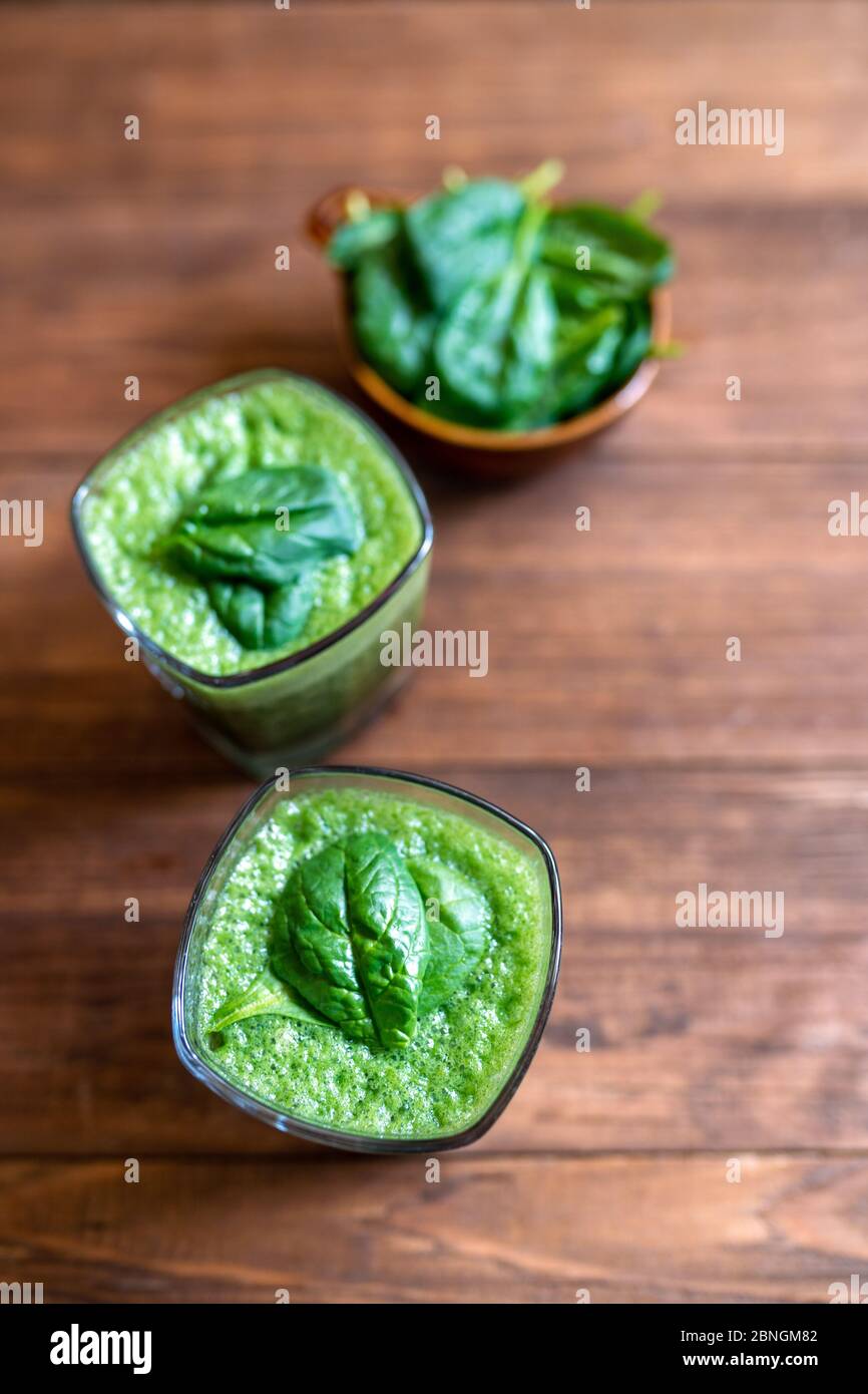 Spinach smoothie made with banana, baby spinach and spirulina powder