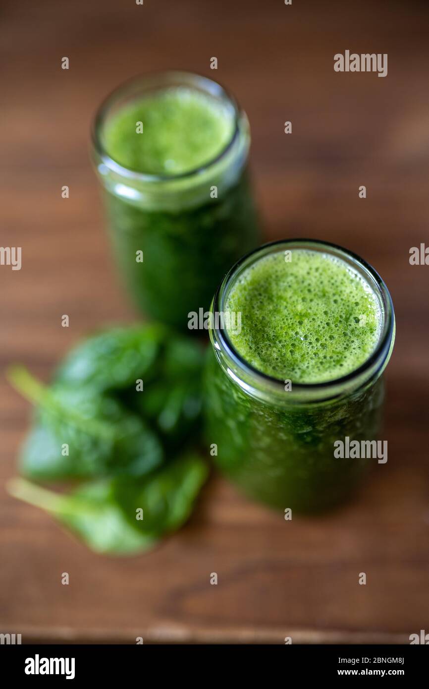 Spinach smoothie made with banana, baby spinach and spirulina powder