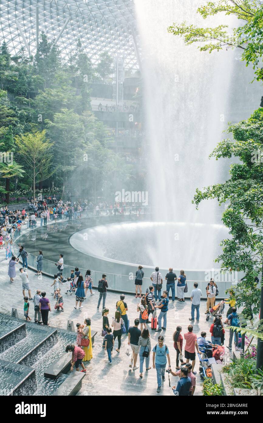 SINGAPORE - June, 2019 : The world's tallest indoor water fall in Jewel Changi Airport development at Changi Airport in Singapore Stock Photo