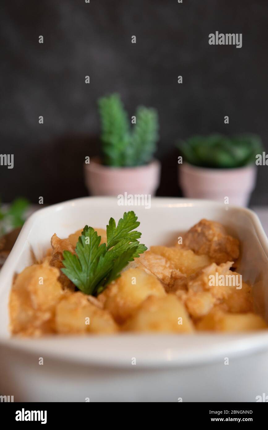 tuna and potato stew called marmitako. Traditional Basque recipe with ...