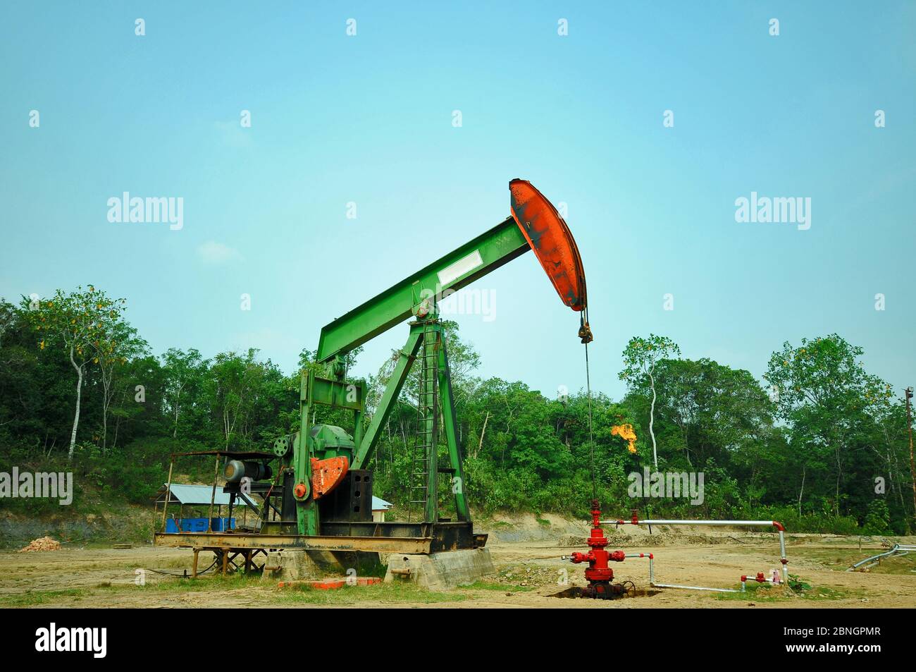 Pumpjack pumping crude oil from oil well Stock Photo
