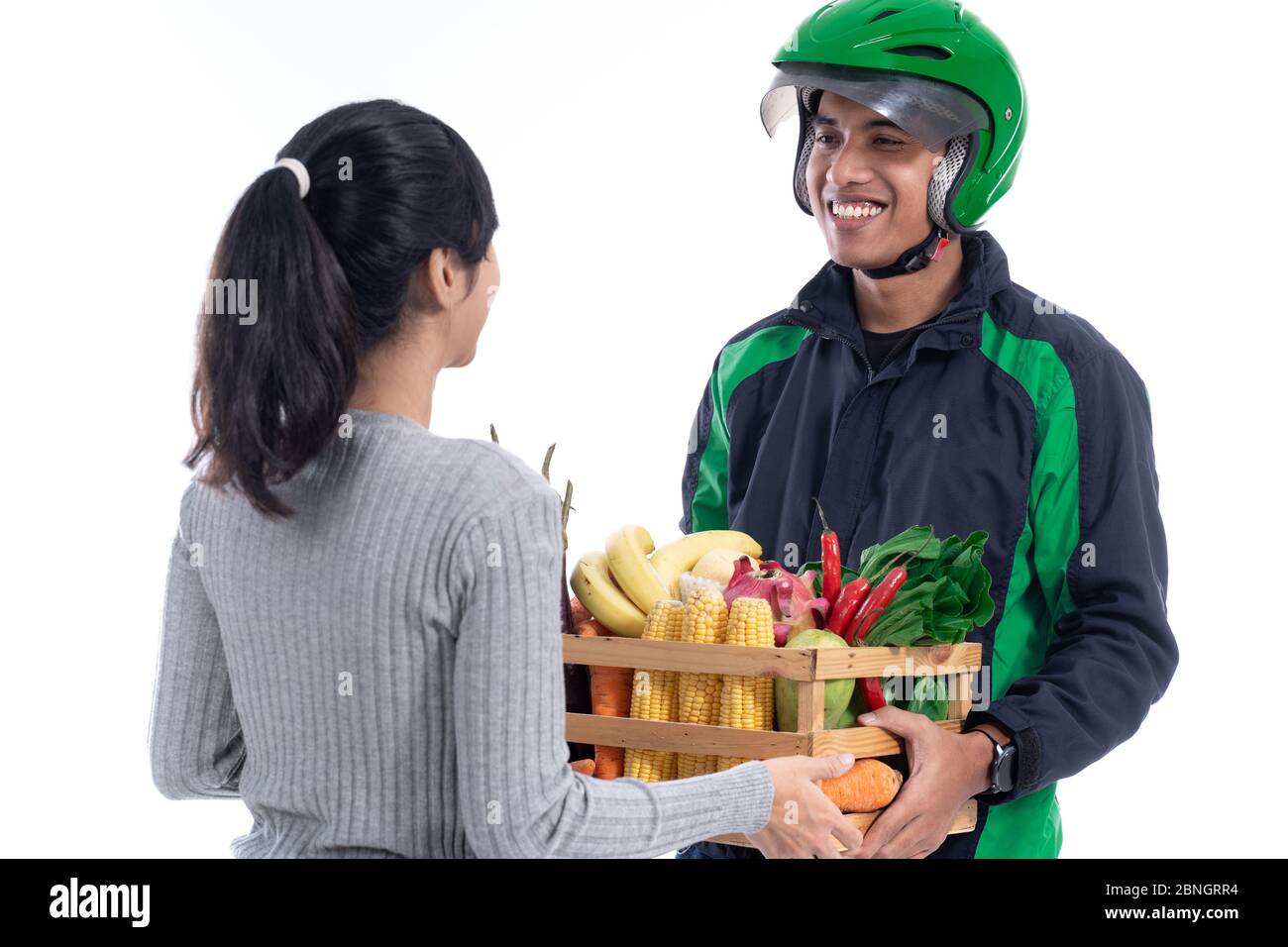 online grocery shopping. delivery man deliver food order to customer