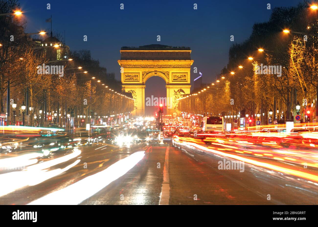 Arc De Triomphe and light trails, Paris Stock Photo