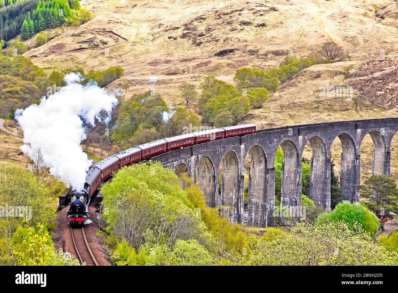 LMS Stanier Class 5 4-6-0 45231 steam engine pulls the Jacobite steam train across Glenfinnan Viaduct en route to Mallaig from Fort William Stock Photo