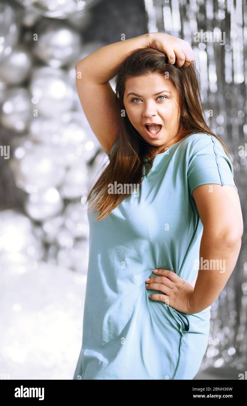 Portrait of the playful plus size model Stock Photo - Alamy