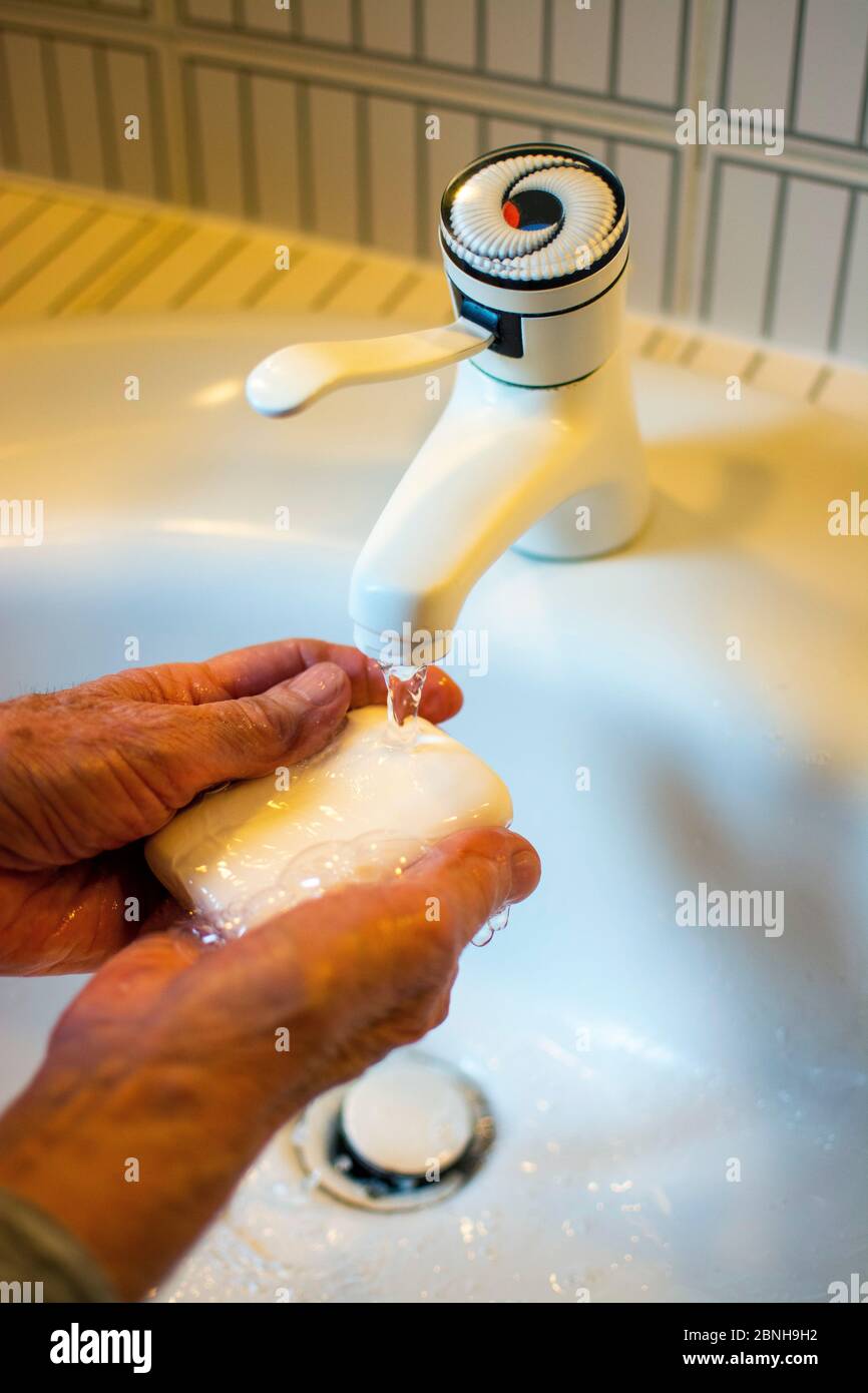 Washing of hands with soap Stock Photo