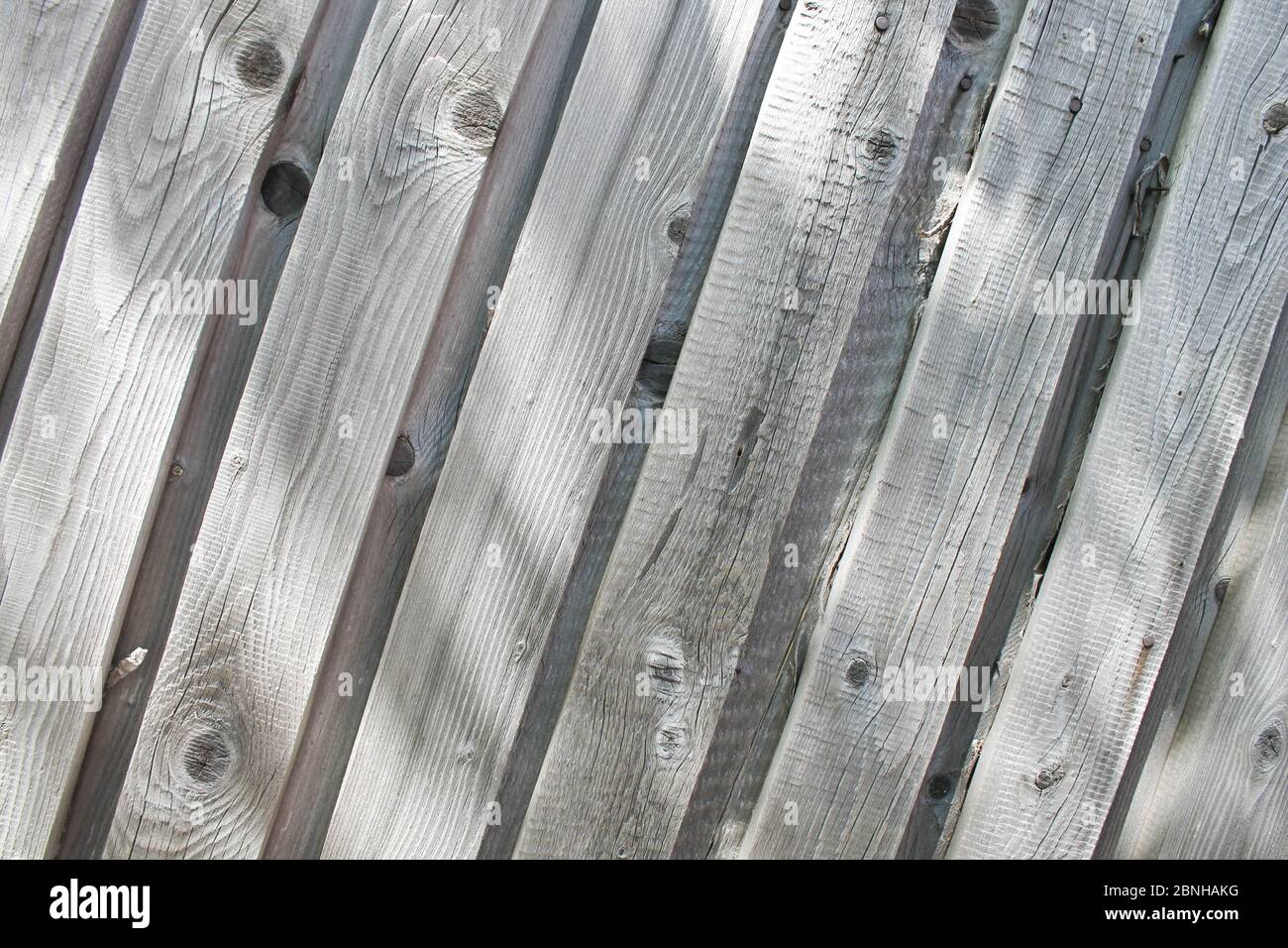 The texture of wooden boards with sun flare.  Stock Photo