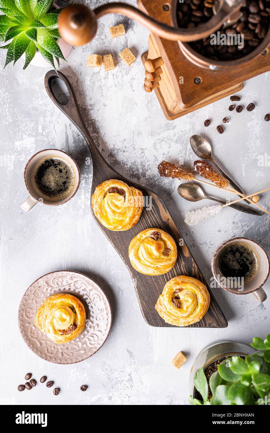 Sweet swirl buns with raisins for breakfast Stock Photo