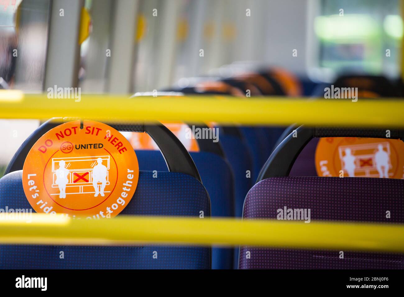 Safety distancing in place on a bus during this coronavirus pandemic, singapore Stock Photo