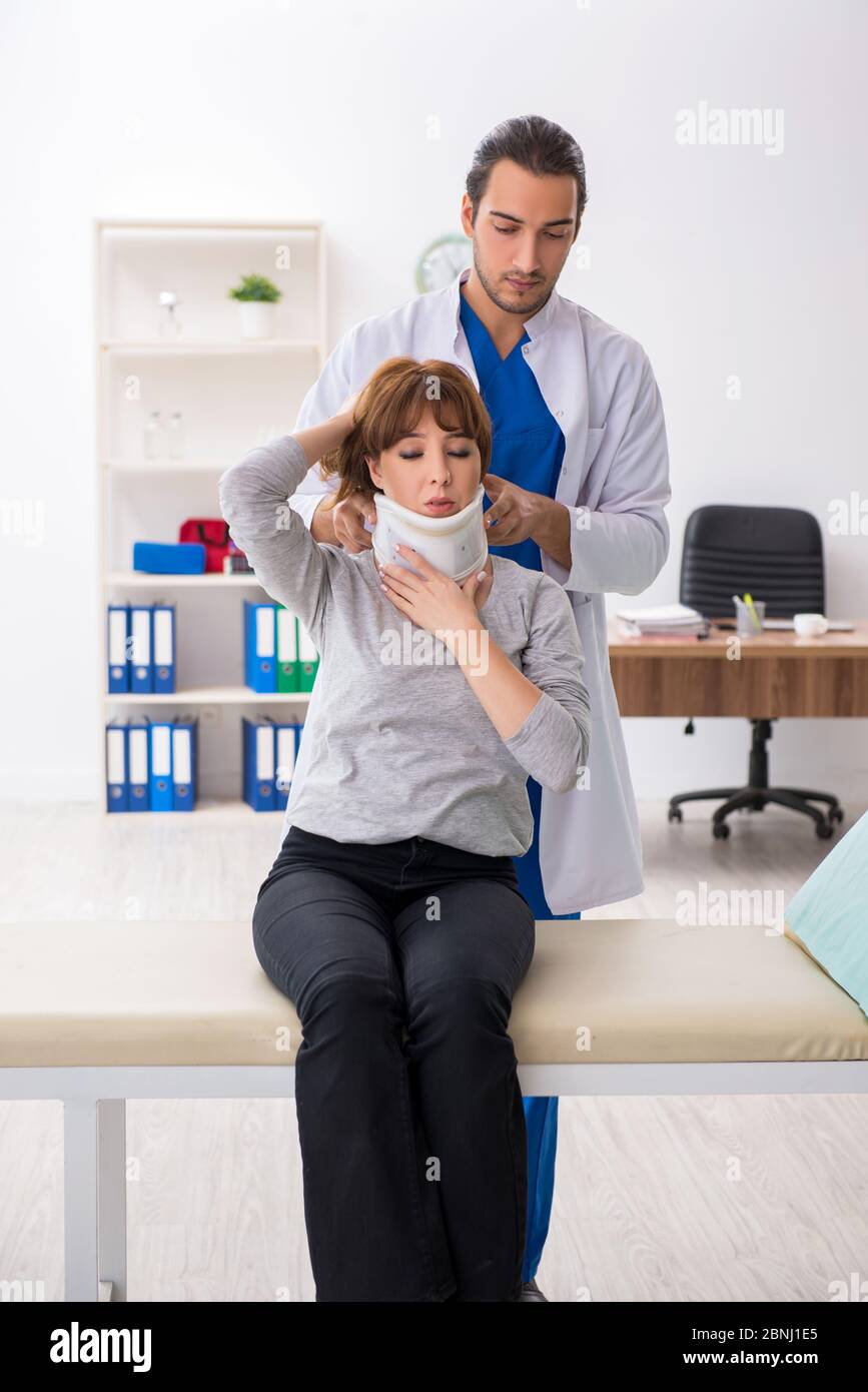 Young injured woman visiting hi-res stock photography and images - Alamy