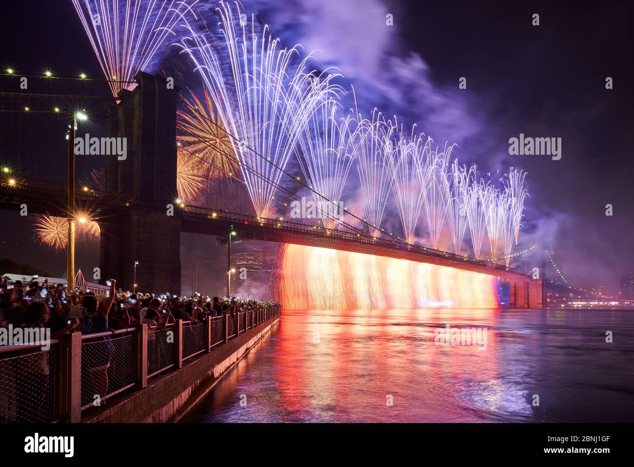 New York City, NY, USA - July 04, 2019: 4th of July Independance Day Fireworks (Macys) over the Brooklyn Bridge. Lower Manhattan Stock Photo